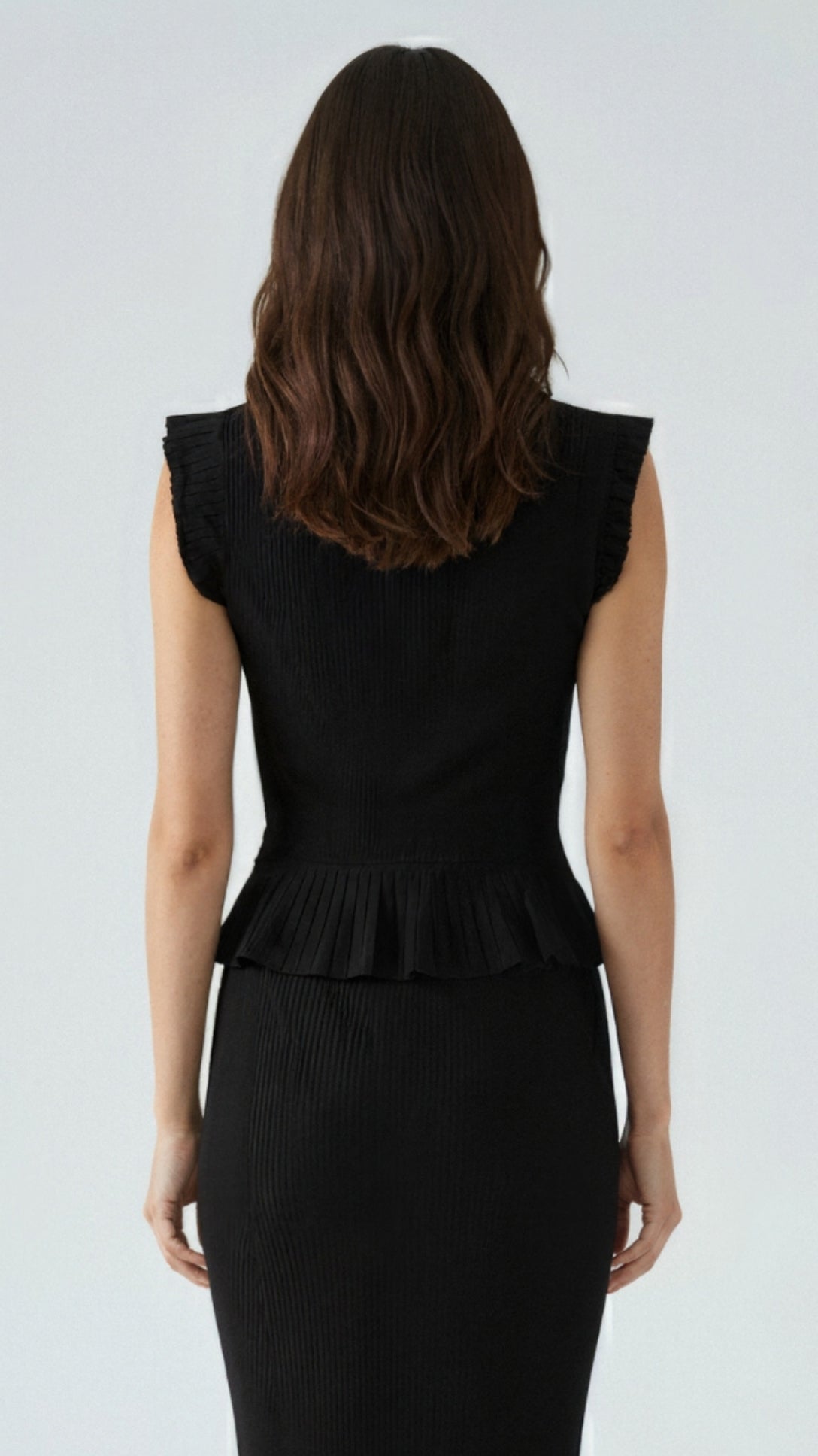 Carol Geripptes Strickoberteil mit Rüschen