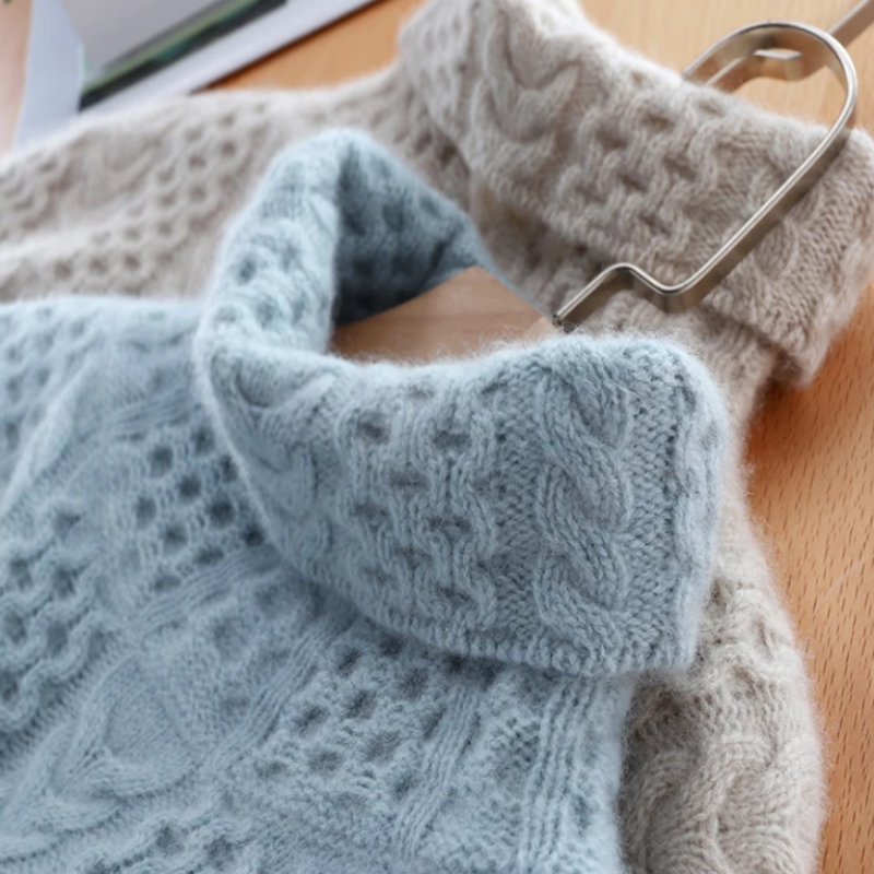 Blanche Pullover mit Zopfmuster