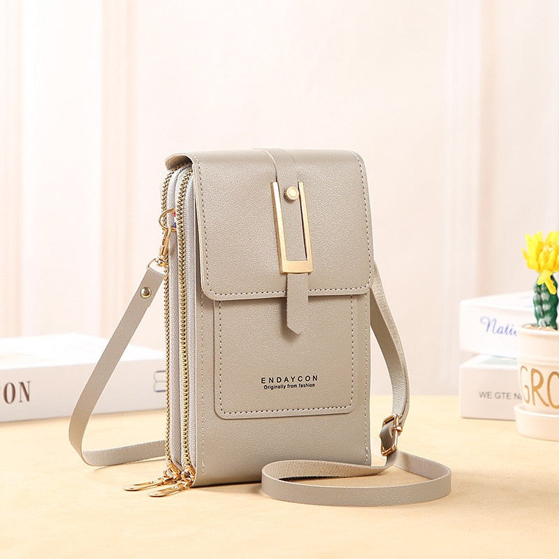 Seline Clutch mit Touchscreen-Fenster