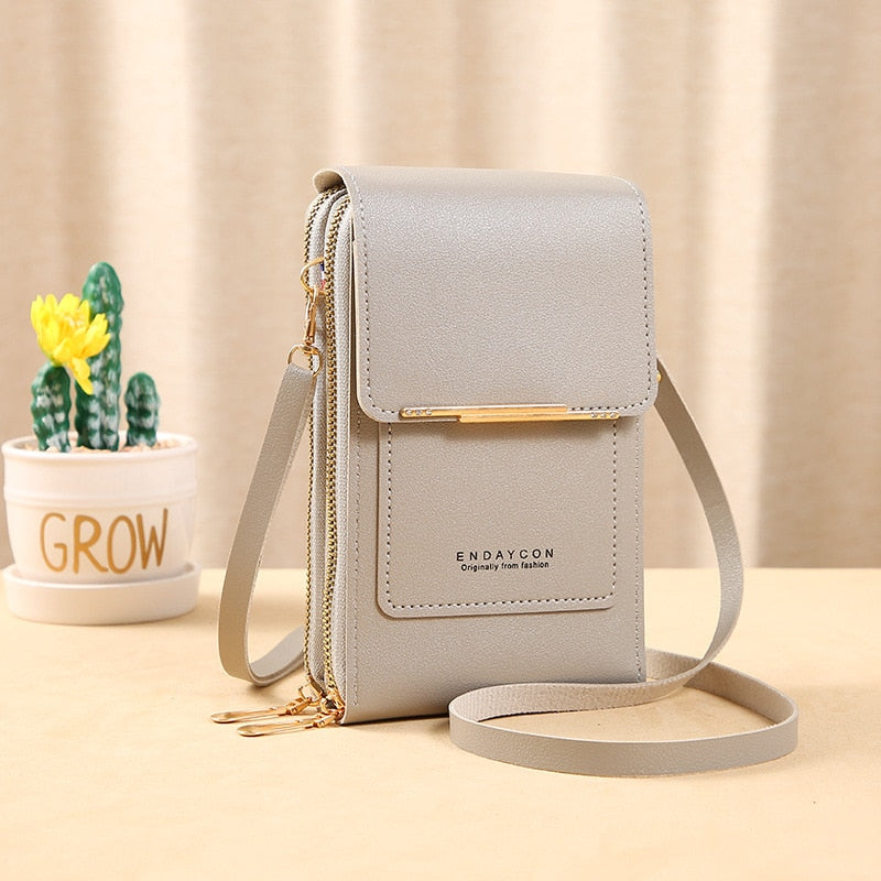 Seline Clutch mit Touchscreen-Fenster