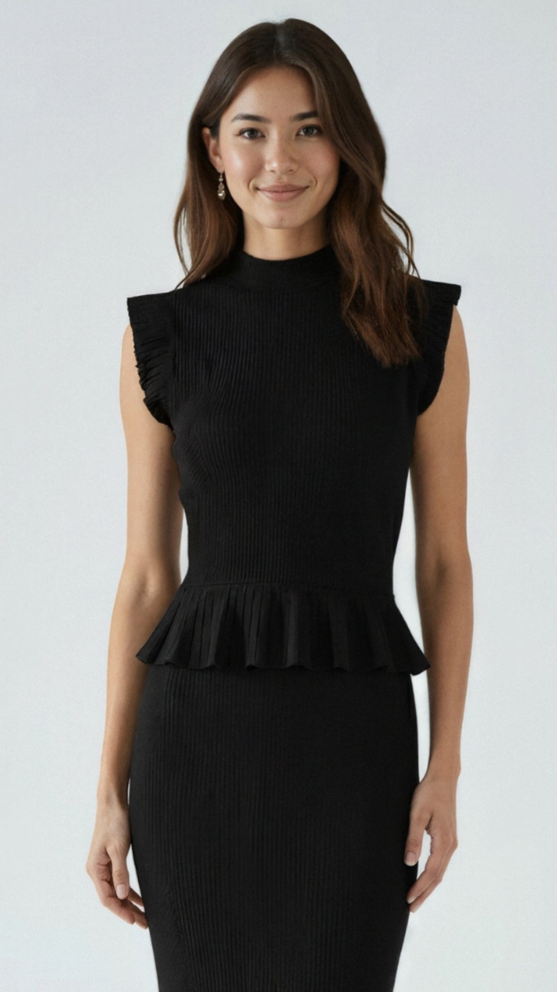 Carol Geripptes Strickoberteil mit Rüschen